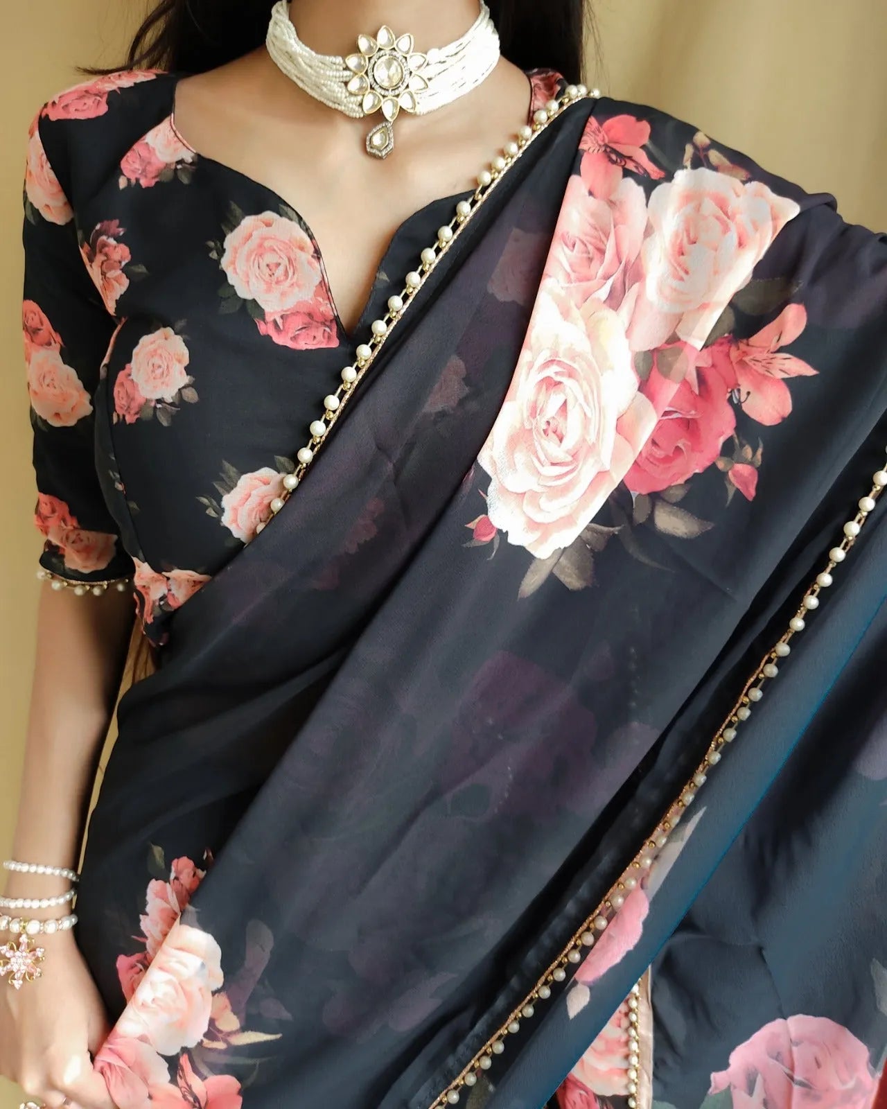 Elegance Redefined Georgette Printed Saree with Pearl Lace
