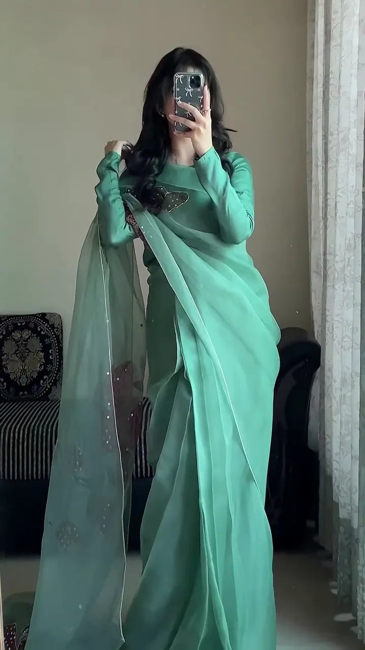 Pastel Green Organza Saree with Hand-Embroidered Floral Motif and Full-Sleeve Blouse – Lightweight Festive Wear for Women